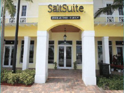 The Salt Suite yellow storefront in Del Ray, Florida.